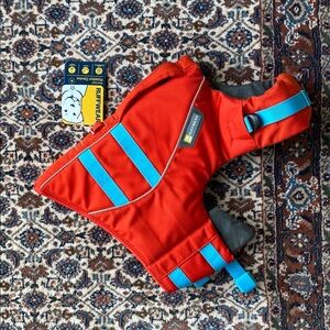 RuffWear Vibrant Red Dog floatation device with Blue Straps
